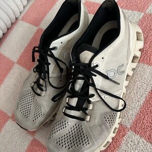 On Running White and Black Sneakers